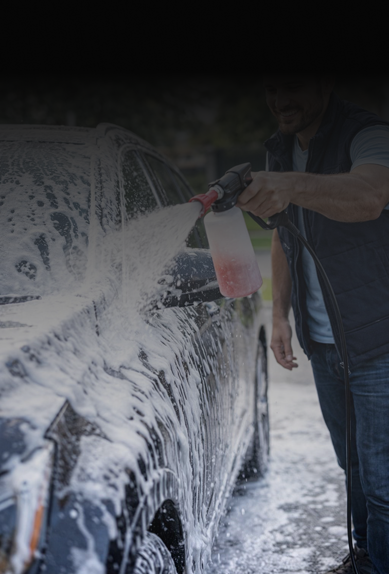 Mobile car detailing professional at work